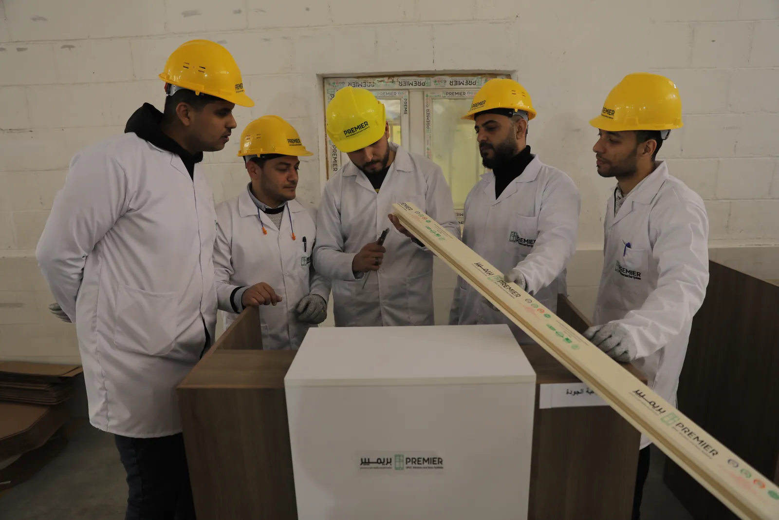 Premier quality-control team inspecting a UPVC profile